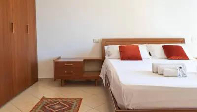 Letto o letti in una camera di Casa Melia