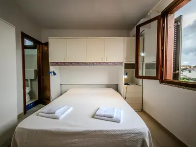 Letto o letti in una camera di Casa di Rita