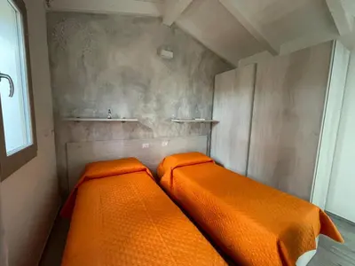 Letto o letti in una camera di Villetta Maluva - Budoni