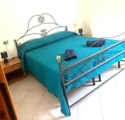 Letto o letti in una camera di Casa Vacanze Da Rita