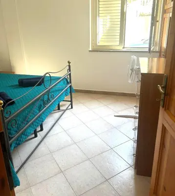 Letto o letti in una camera di Casa Vacanze Da Rita