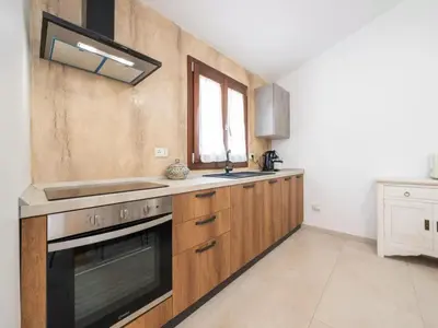 Cucina o angolo cottura di Elegant villa with private pool in San Teodoro
