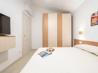 Letto o letti in una camera di Elegant villa with private pool in San Teodoro