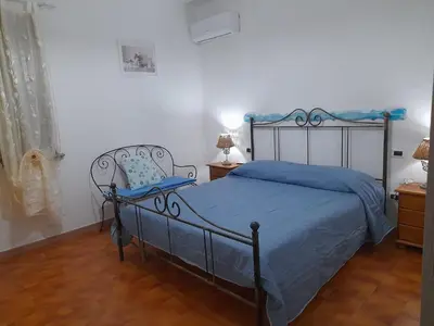 Letto o letti in una camera di Casa Dessy