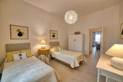 Letto o letti in una camera di Lemon Home