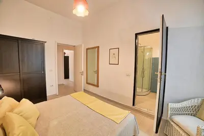 Letto o letti in una camera di Lemon Home