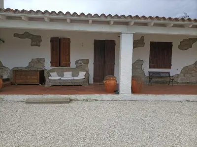 Area soggiorno di Funtana e Caddos apartment