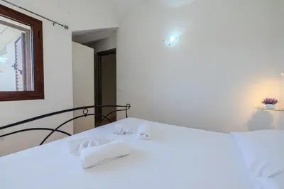 Letto o letti in una camera di La casa al mare- AD GROUP