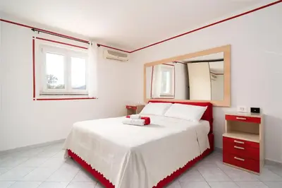 Letto o letti in una camera di Le Cale
