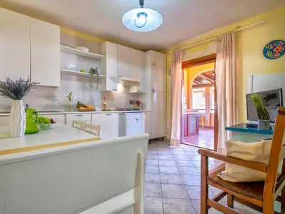 Cucina o angolo cottura di Apartment two bedrooms in Marinella just 150 mt from the sea