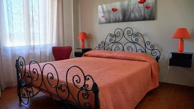 Letto o letti in una camera di Villa Marì Budoni