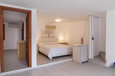 Letto o letti in una camera di Casa Leo by Wonderful Italy