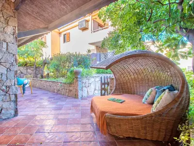 Giardino di Apartment 5 beds with fenced garden in Marinella just 300 mt from the sea