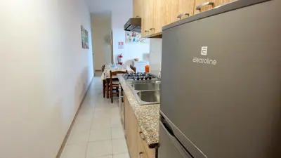 Cucina o angolo cottura di Casa Duna 'E Mare con accesso diretto alla spiaggia