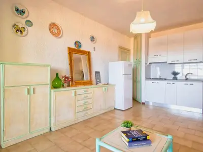 Cucina o angolo cottura di Apartment 5 beds in Marinella with SEA VIEW