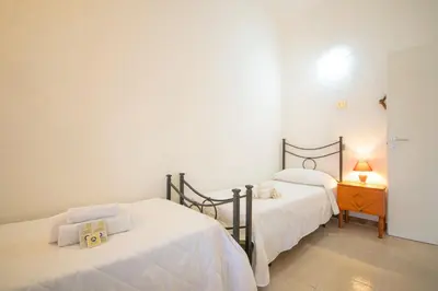 Letto o letti in una camera di San Giovanni 1