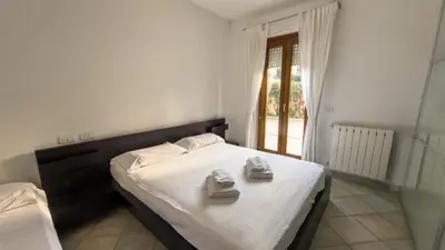Letto o letti in una camera di Casa Aurora