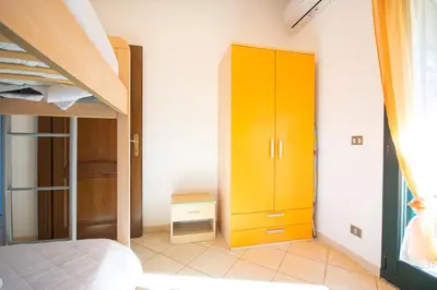 Letto o letti in una camera di Villa Stella Maris