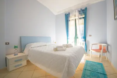 Letto o letti in una camera di Villa Stella Maris