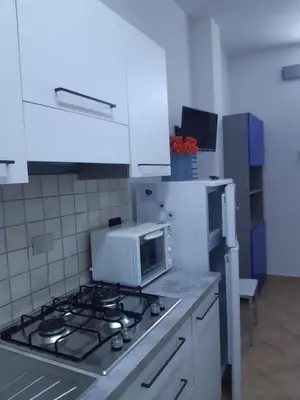 Cucina o angolo cottura di YAYA appartamenti vacanza