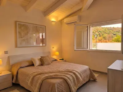 Letto o letti in una camera di Apartment Sutt'e Riu by Interhome