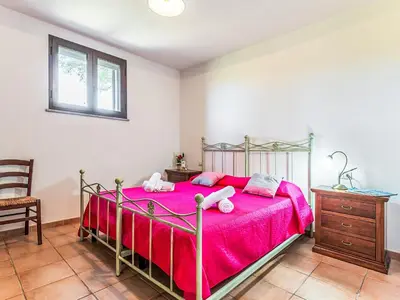 Letto o letti in una camera di Apartment Pompia-4 by Interhome