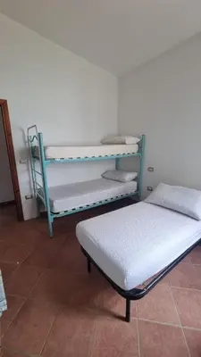 Letto o letti in una camera di Casa Antonietta