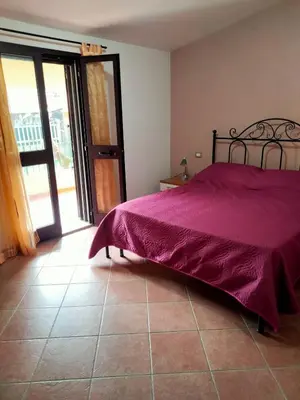 Letto o letti in una camera di Casa Antonietta