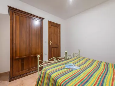 Letto o letti in una camera di Home thoughtfully designed to offer comfort