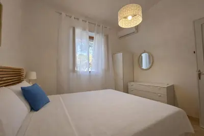 Letto o letti in una camera di Blue Horizon Villa - Villa a pochi passi dal mare