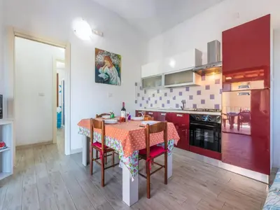 Cucina o angolo cottura di Bright detached villa in Capo Comino