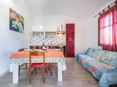 Area soggiorno di Lovely detached villa in Capo Comino