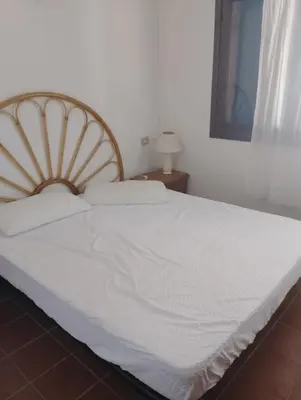 Letto o letti in una camera di Residence Costa Caddu San Teodoro