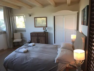 Letto o letti in una camera di Villa Babsy con piscina privata