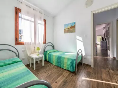 Letto o letti in una camera di Delightful and spacious villa in Capo Comino