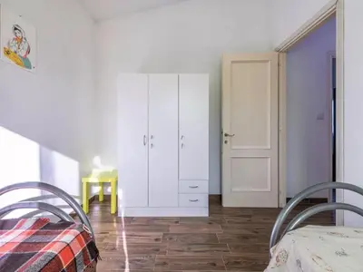 Letto o letti in una camera di Delightful and spacious villa in Capo Comino