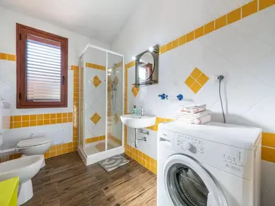 Bagno di Delightful and spacious villa in Capo Comino