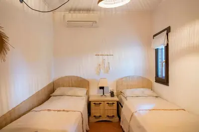 Letto o letti in una camera di Casa Nurru
