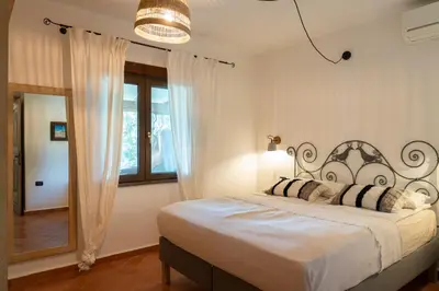Letto o letti in una camera di Casa Nurru