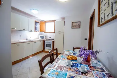 Cucina o angolo cottura di Appartamenti Quercia e Olivo