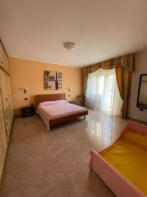 Letto o letti in una camera di Casa Terrazza Sardegna