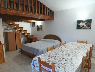 Letto o letti in una camera di Casa Alma