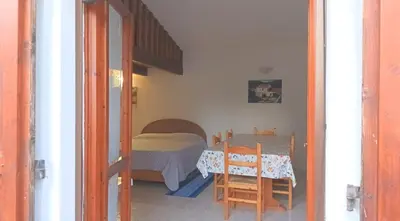 Letto o letti in una camera di Casa Alma