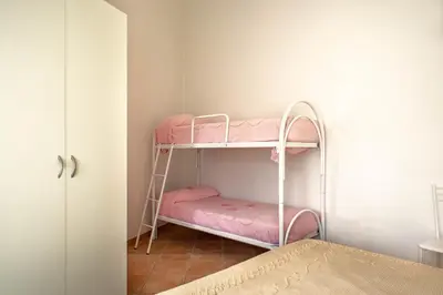 Letto o letti in una camera di La Casa Di Natasha - Budoni Sweet Home