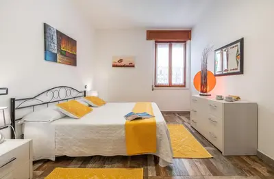 Letto o letti in una camera di Casa Rettore Mura