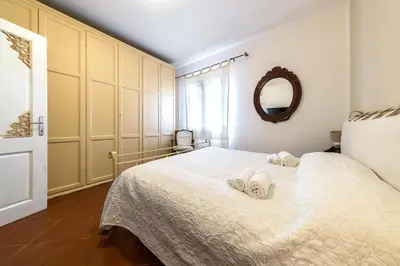 Letto o letti in una camera di Olbia Villa Doriana 2BR 5PX FreePark Jacuzzi