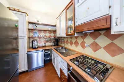 Cucina o angolo cottura di Olbia Villa Doriana 2BR 5PX FreePark Jacuzzi