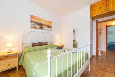 Letto o letti in una camera di villetta ìsabella