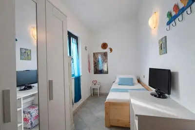 Letto o letti in una camera di Lovely Villino Relax