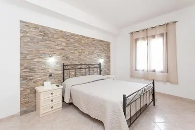 Letto o letti in una camera di Affittacamere Mare Sole
